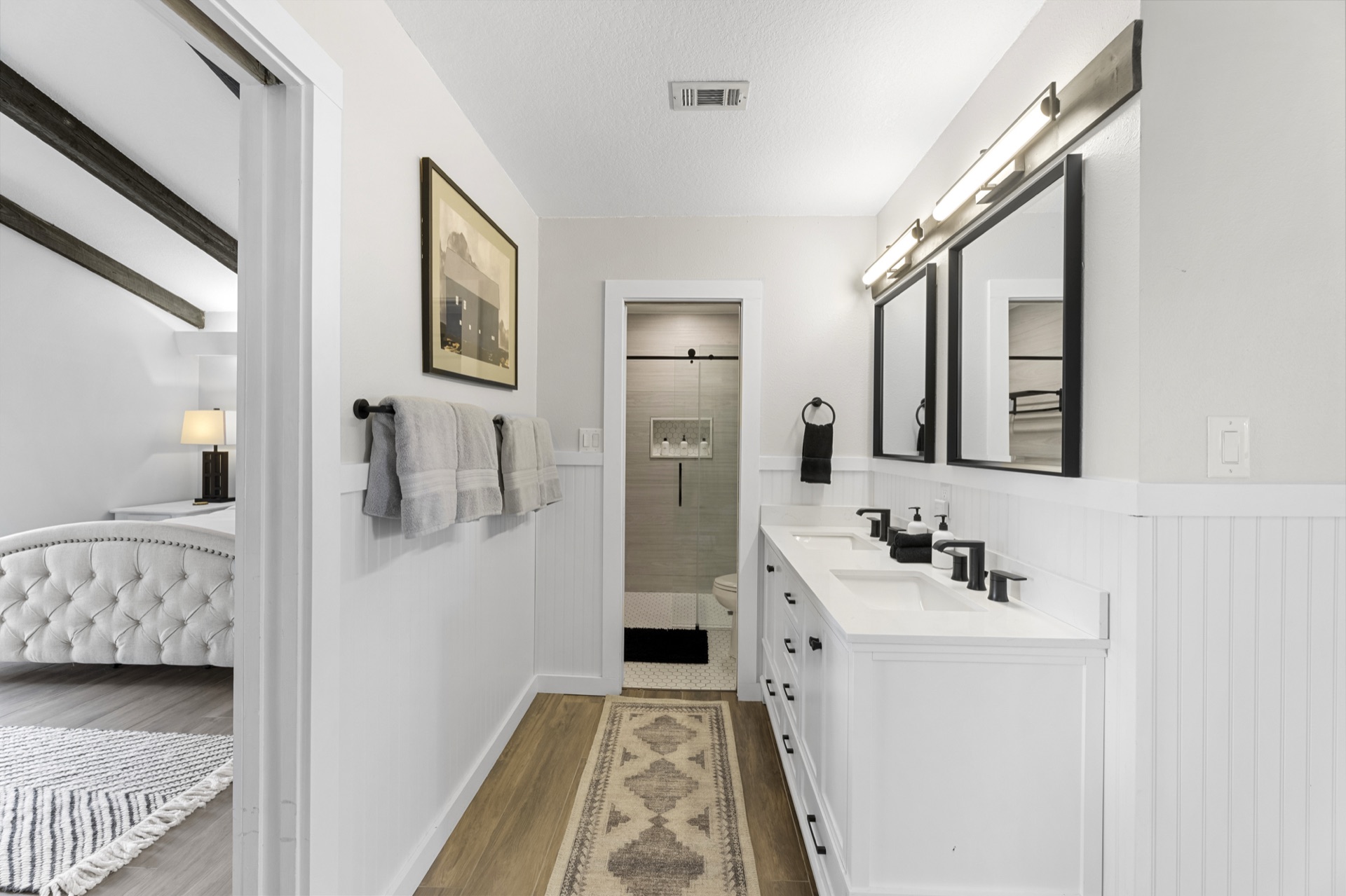 Master en-suite bathroom with double vanity and walk-in shower